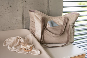 bold beige weekender bag with elegant velvet texture and multiple pockets for organized travel