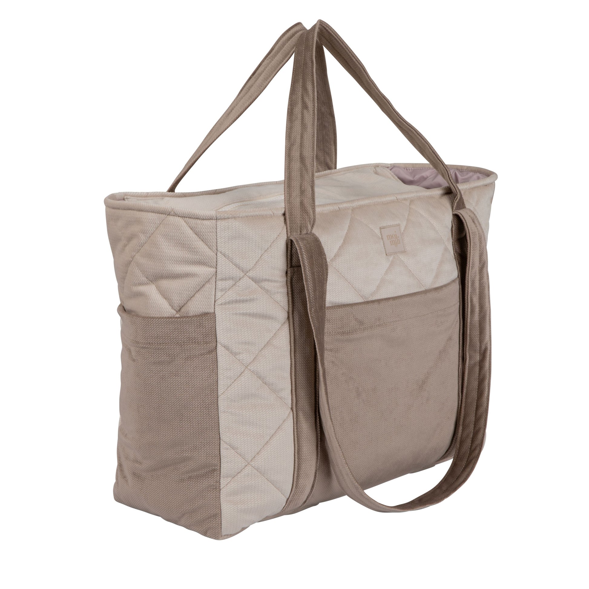 elegant beige weekender bag with velvet texture, showcasing its sleek zipper closure and structured pockets