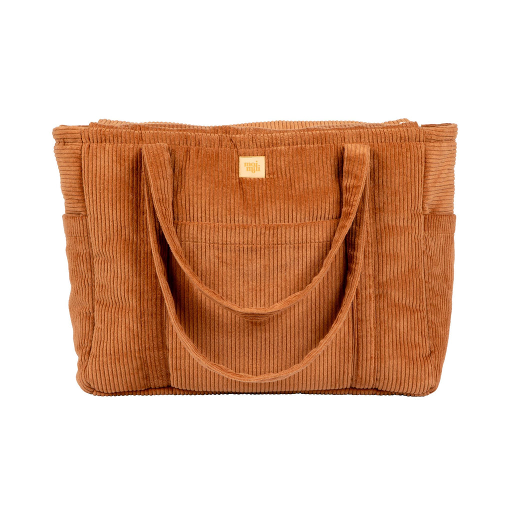 playful caramel weekender bag with velvet texture, open to show inner pockets, ready for adventure