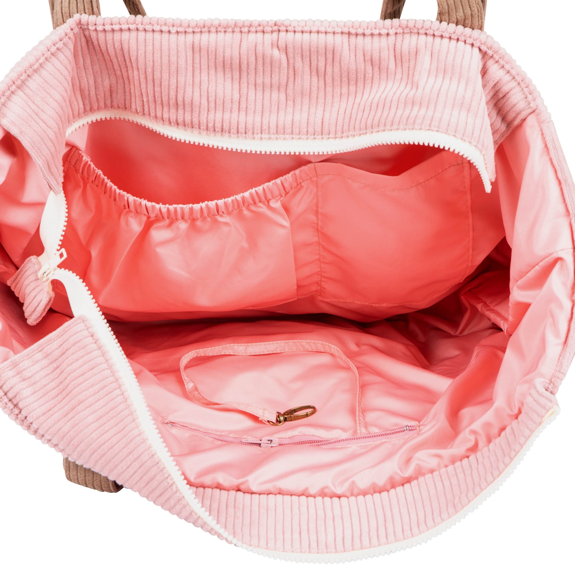 pink coffee weekender mom bag with velvet exterior and waterproof lining, shown open to reveal multiple pockets