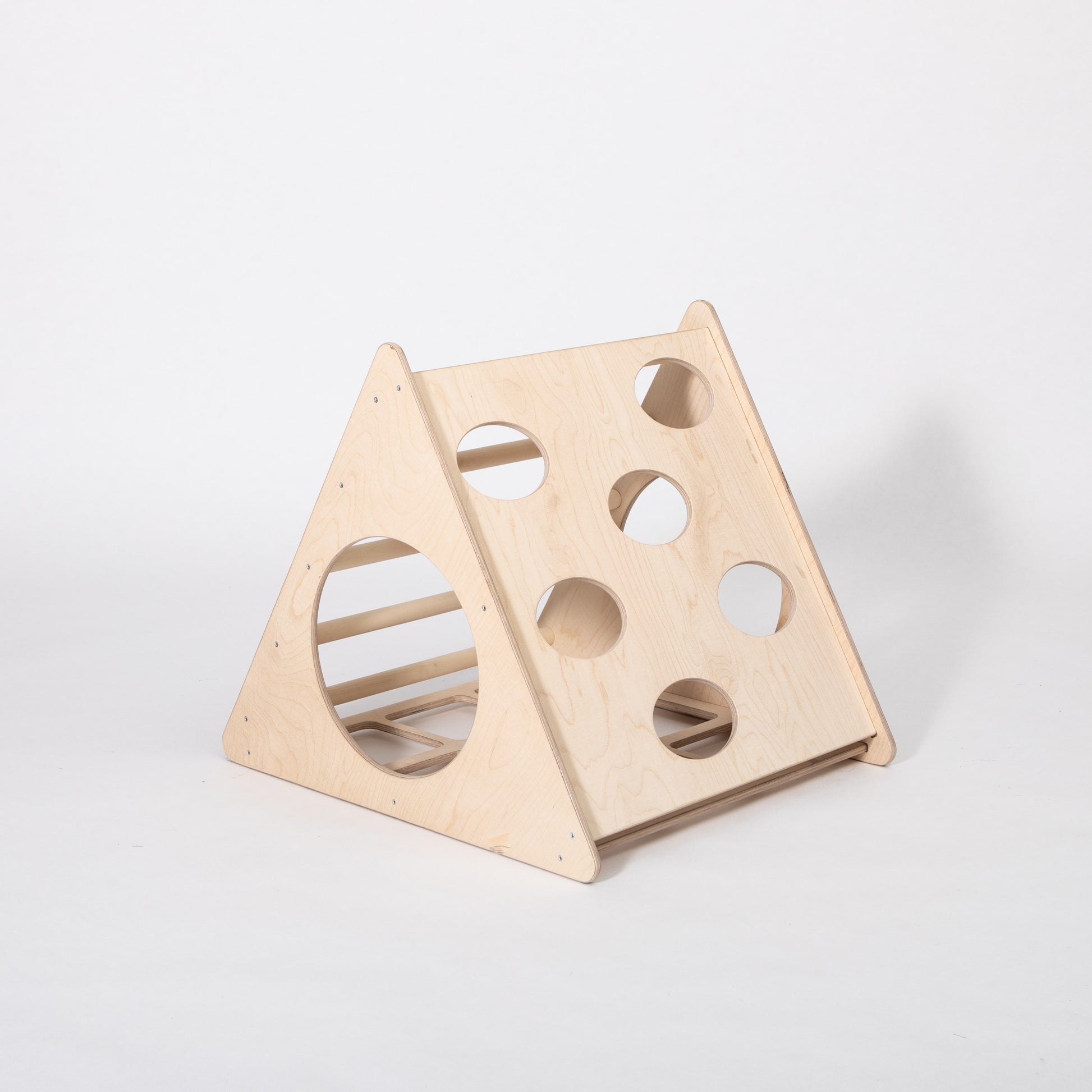 montessori 3-angle climber in a cozy playroom, bathed in warm sunlight, inviting toddlers to climb and explore