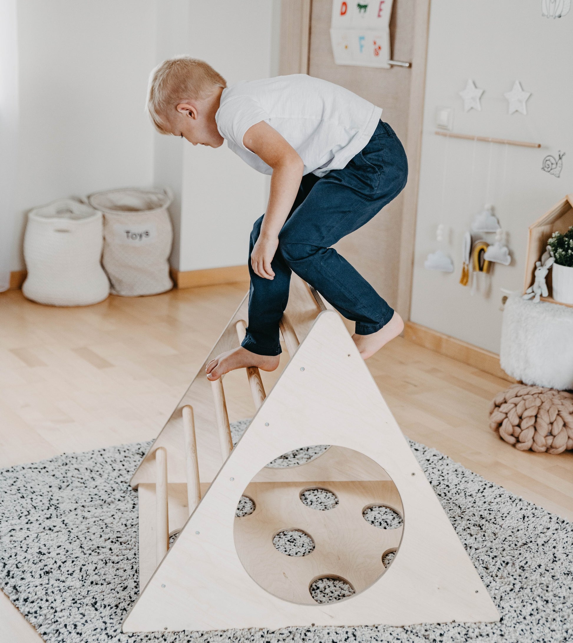 soft-lit montessori 3-angle climber in a cozy nursery, showcasing smooth birch plywood and safe, sturdy design
