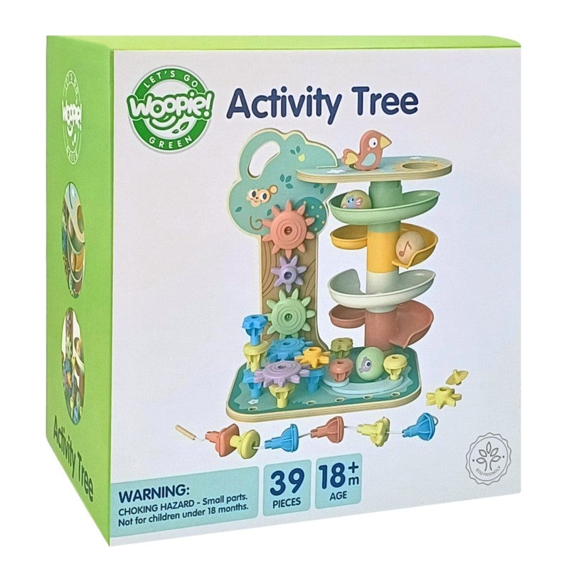 a toddler's hand guiding a colorful ball down the fun wooden tree track