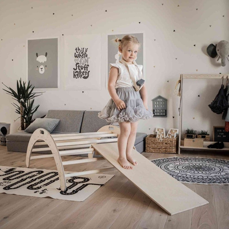 bold montessori climbing arch with ramp in natural wood, showcasing sturdy design for active play and balance