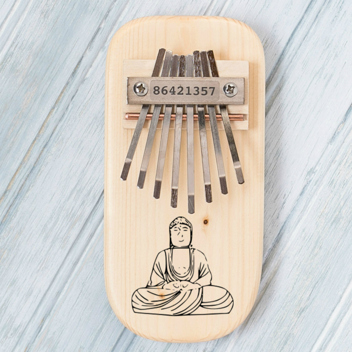 Buddha Engraved Thumb Piano with Songbook