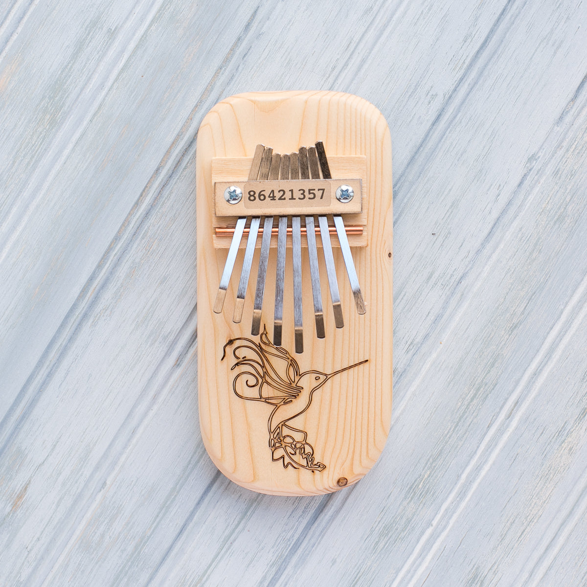 Hummingbird Engraved Thumb Piano