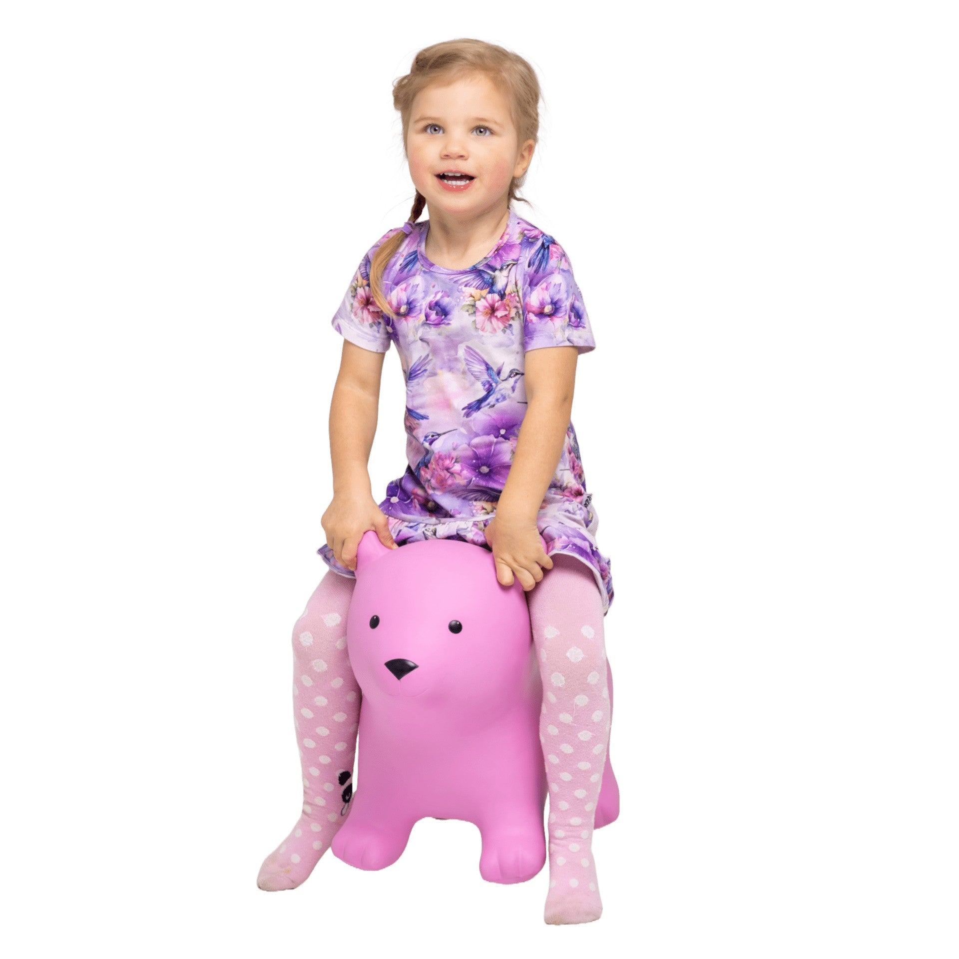 bold pink bear hopper toy for kids bouncing on a bright background