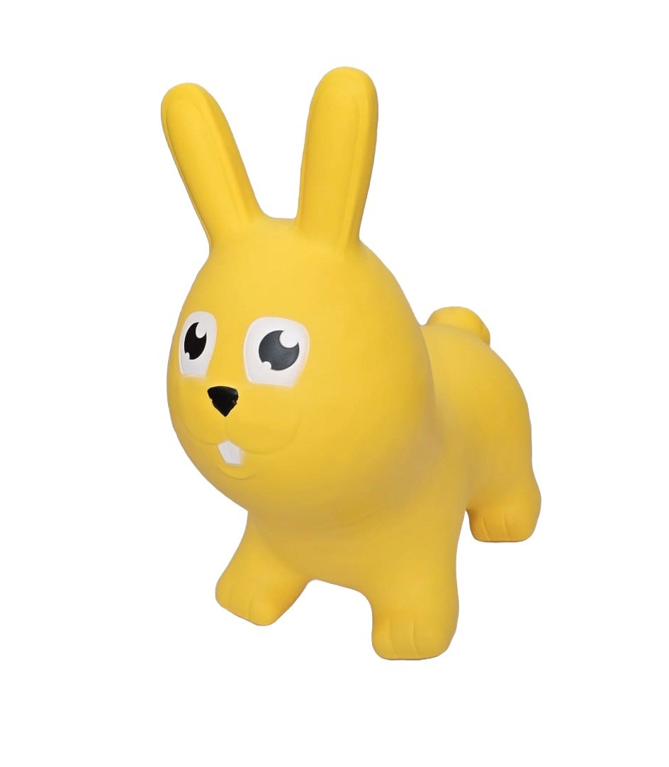 soft yellow bunny toy sitting gently in a cozy nursery corner