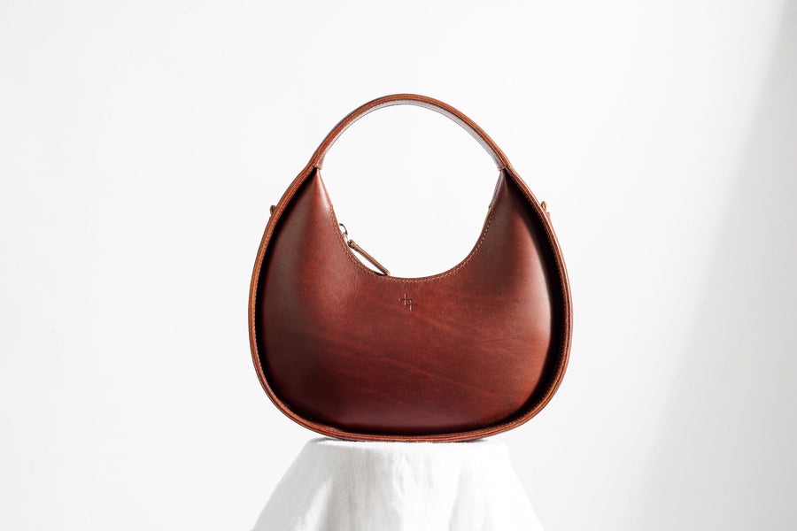 Elegant Mini Moon Sling Bag – Versatile & Stylish Leather by Craftory at brixbailey.com