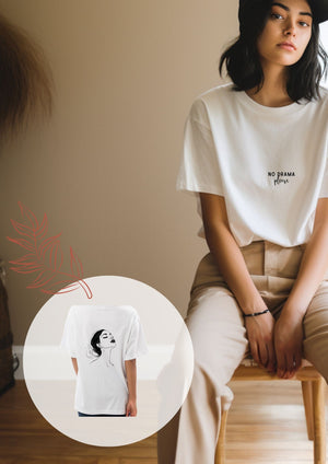 a soft black organic cotton t-shirt with subtle text, bathed in gentle morning light