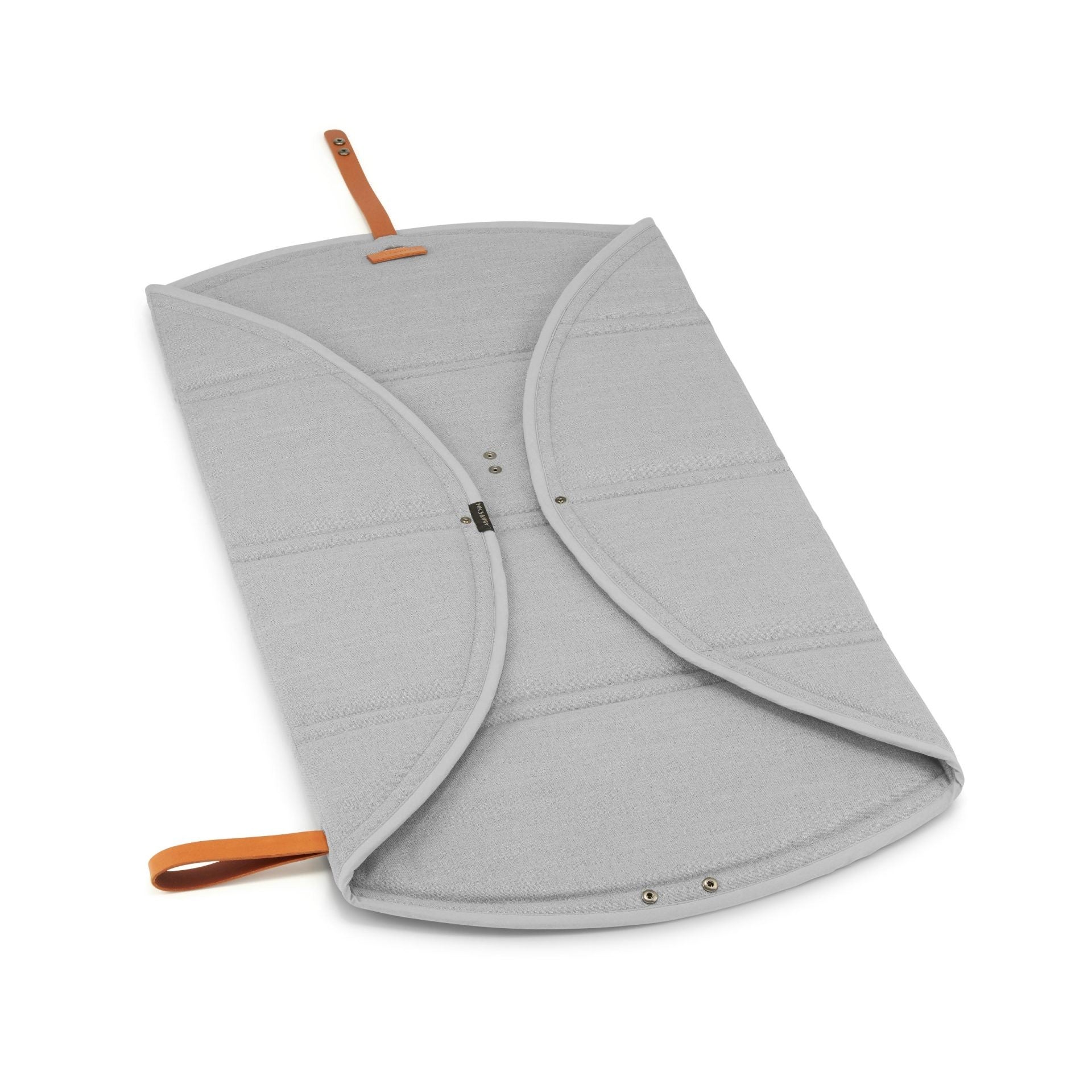 soft grey okka travel mat for dogs folded neatly on a cozy blanket
