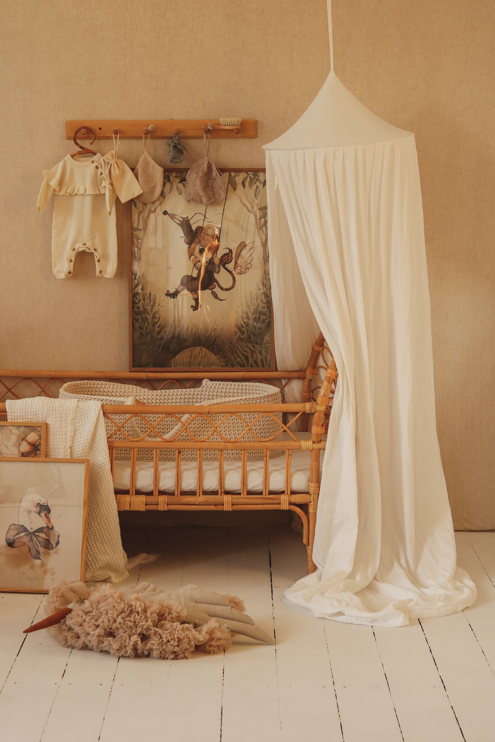 soft cream cotton canopy draped gently over a serene reading nook, glowing in warm afternoon light