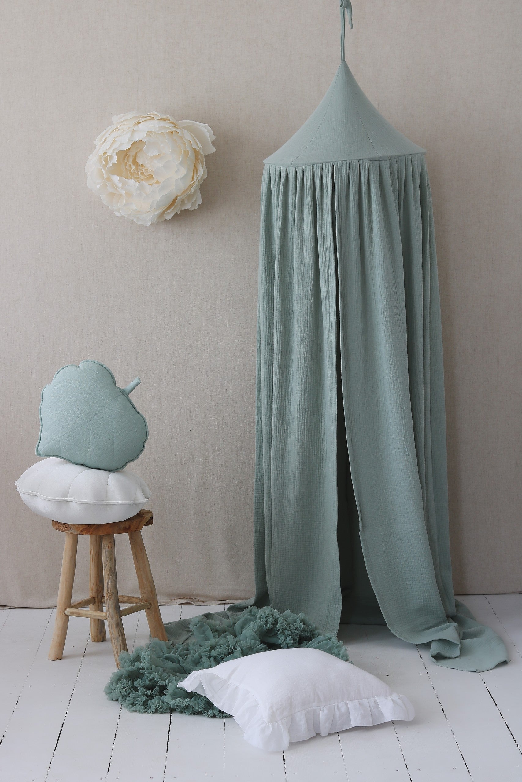 bold mint cotton canopy hanging over a childs bed - a confident statement piece for a serene hideout
