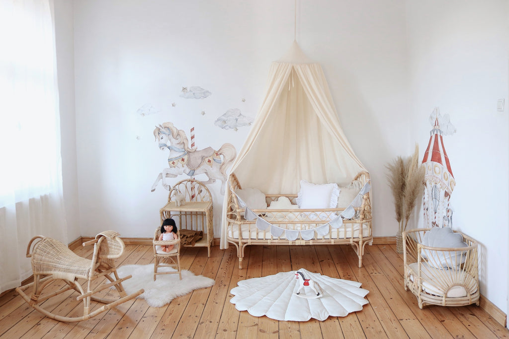 bold organic cotton canopy hanging over a cozy bed, ready for quiet play or dreamy naps