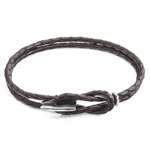 Embrace Elegance with the Dark Brown Padstow Silver and Braided Leather Bracelet by ANCHOR & CREW at www.brixbailey.com