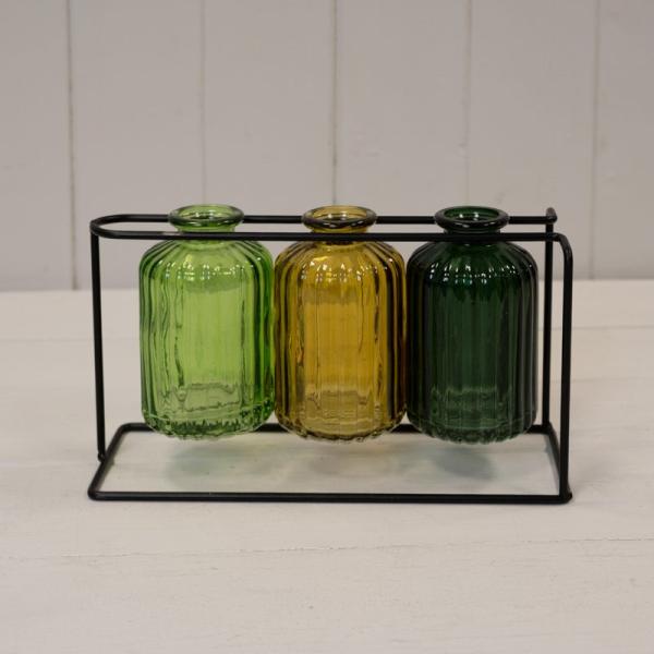 Three Glass Bottles with Stand