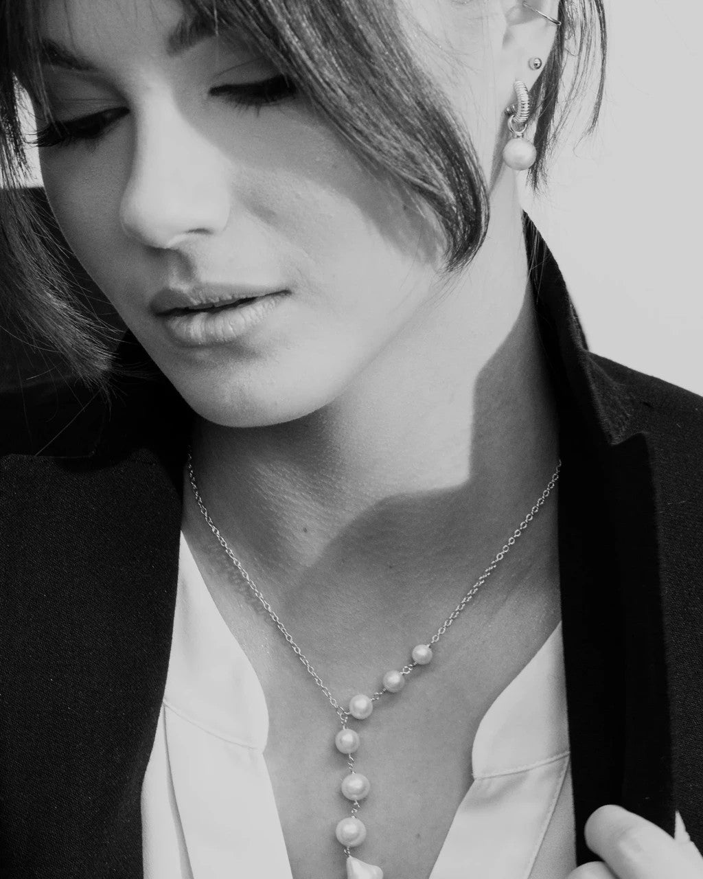 Outstanding Silver Pearl Pendant Necklace with Extension Chain - Elegant & Versatile Jewelry by MyaMoon at www.brixbailey.com