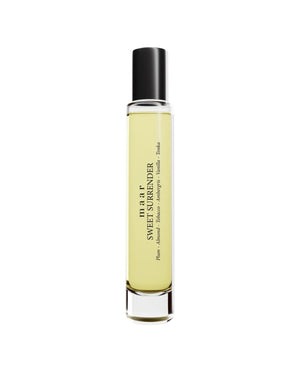 bold closeup of sweet surrender perfume oil with rich plum and tobacco notes