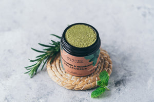 a soft-focused shot of the piece of heaven gift box with the blueberry lavender scrub open