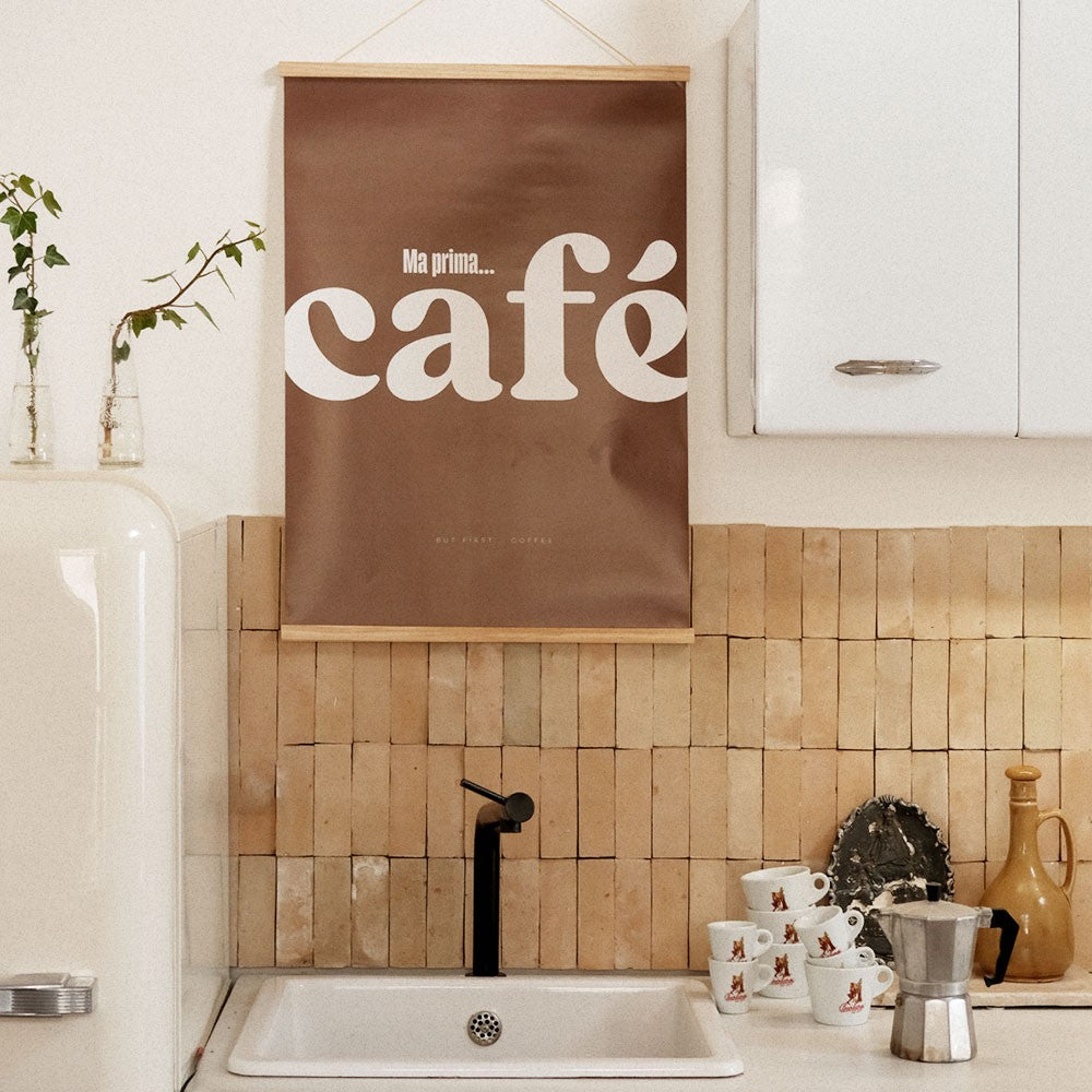 playful close-up of the italian cafe poster's sweet typography on a bright yellow wall