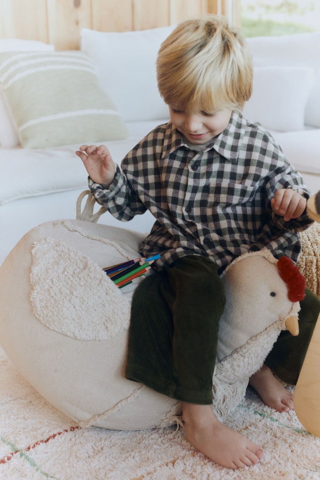 The Chicken Pouf: Rustic, Handcrafted Cotton Decor Piece with Unique Fringe & Woven Details - Perfect for a Warm, Cozy Child's Room by Lorena Canals at www.brixbailey.com