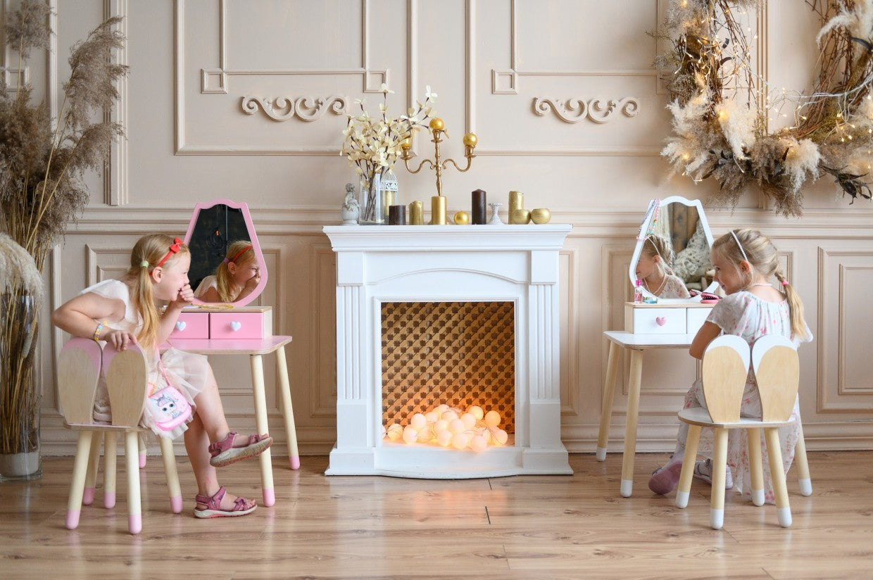a playful tulip princess table with a sparkling mirror and open drawers