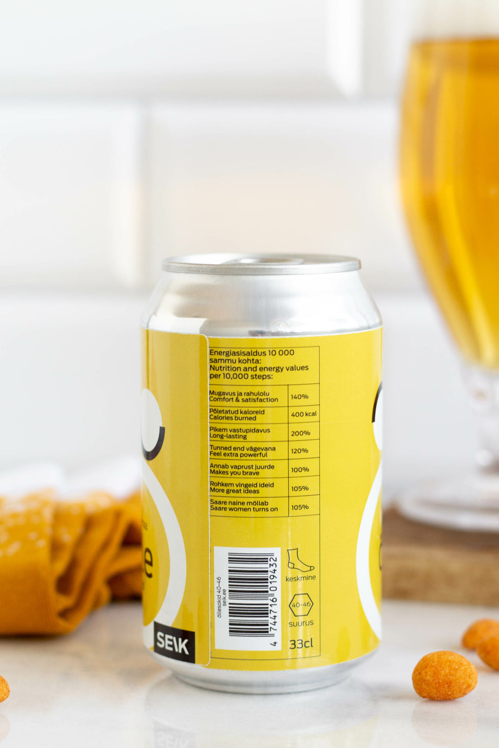 saaremaa beer socks laid flat on a rustic wooden table, showcasing the cozy knit texture