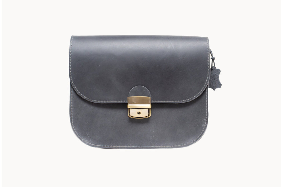 Classic Cut Saddle Bag – Timeless Elegance & Versatility by Zelma Kraft at brixbailey.com