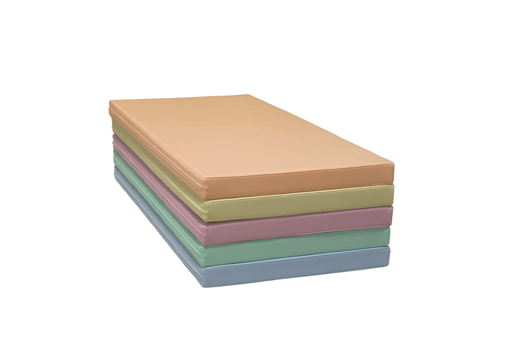 elegant pastel baby play mat set arranged in a chic nursery setting