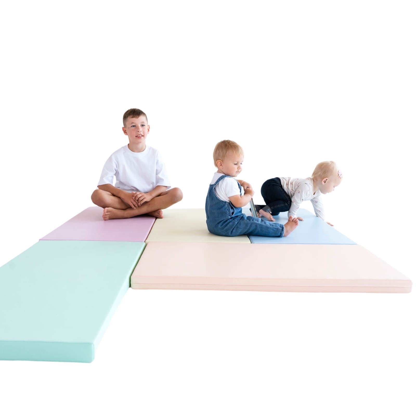 pastel foam play mats stacked in a cozy corner, soft light highlighting their gentle colors and durable texture
