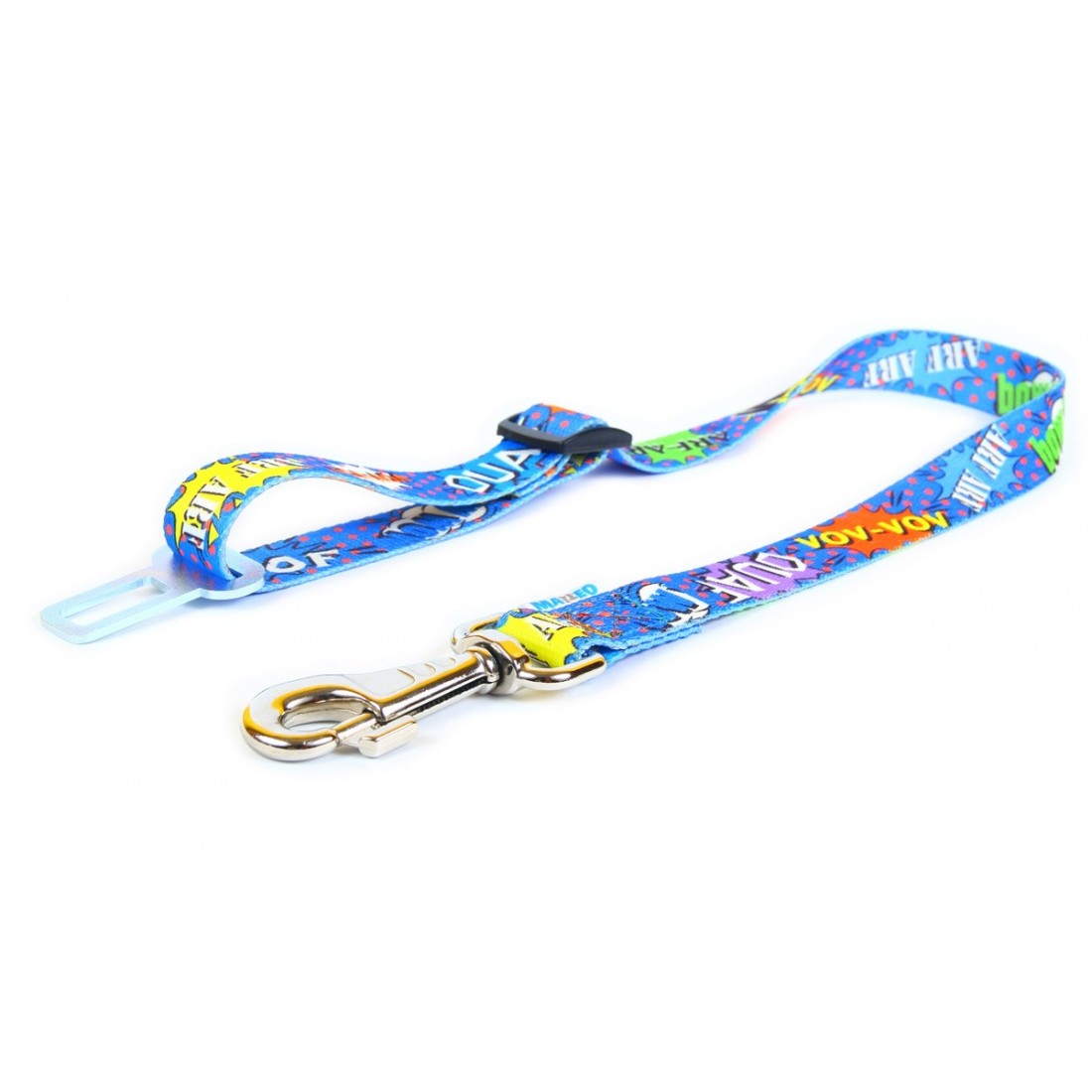 confident dog in car wearing a bold blue graffiti-pattern safety harness