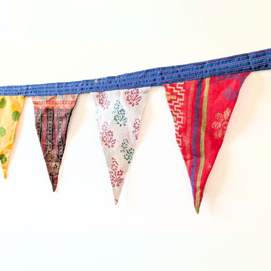 Upcycled sari flags, reusable sari bunting