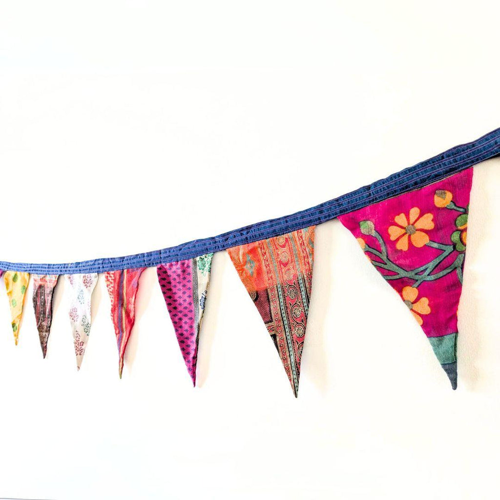 Upcycled sari flags, reusable sari bunting