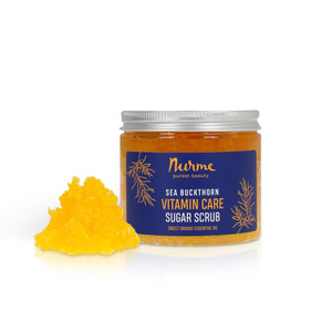 close-up of sea buckthorn and orange sugar scrub with soft morning light