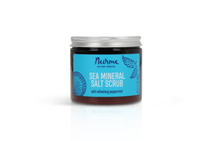 a close-up of nurme's sea mineral body scrub with soft morning light highlighting its creamy texture