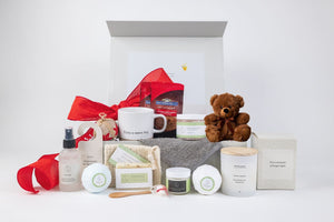 bold presentation of a luxury spa gift set with ceramic mug and eucalyptus bath products