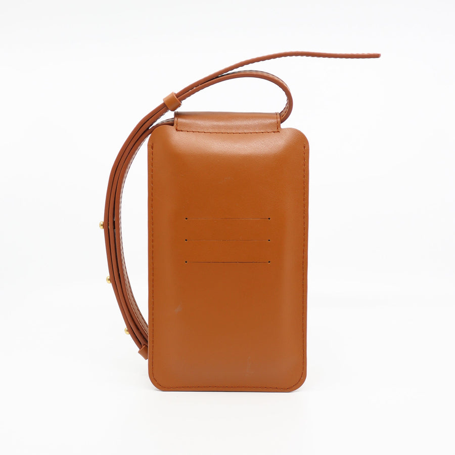 High-Quality Leather Phone Bag – Fits Cards & Smartphones by Tairi Roosve at www.brixbailey.com