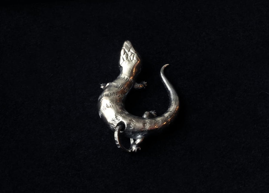 Handcrafted Silver Blue Tongue Skink Charm – Made in Estonia by Hvitolg at www.brixbailey.com