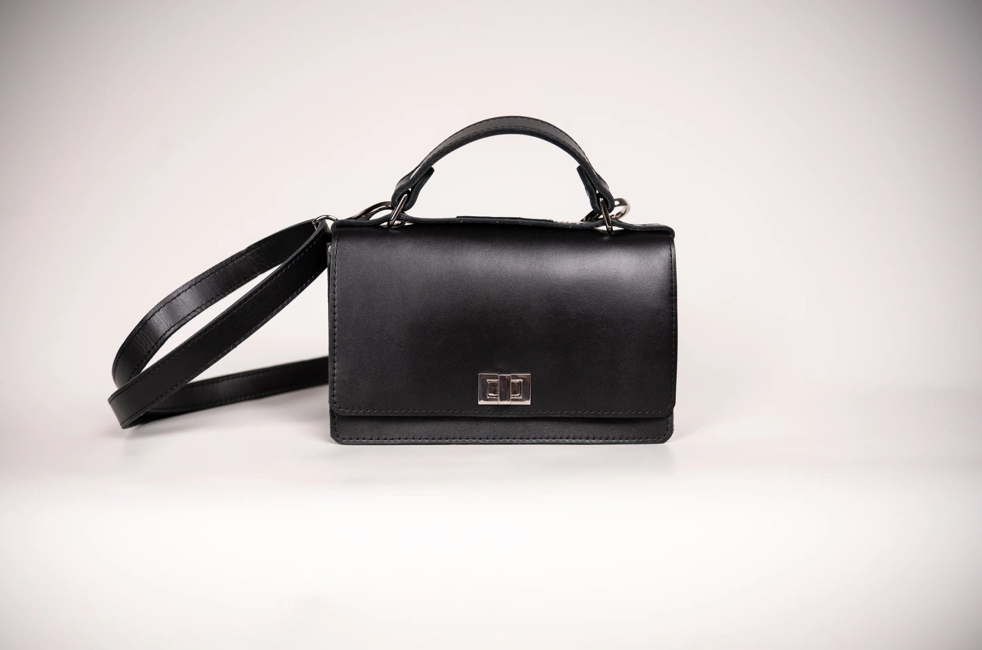 Elegant Everyday Briefcase - Premium Natural Leather with Customizable Clasp and Comprehensive Features by Zelma Kraft at www.brixbailey.com