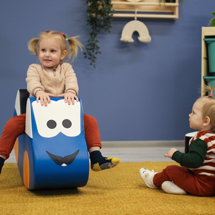 playful blue soft play car ride-on toy for kids, boosting balance and imagination with giggles