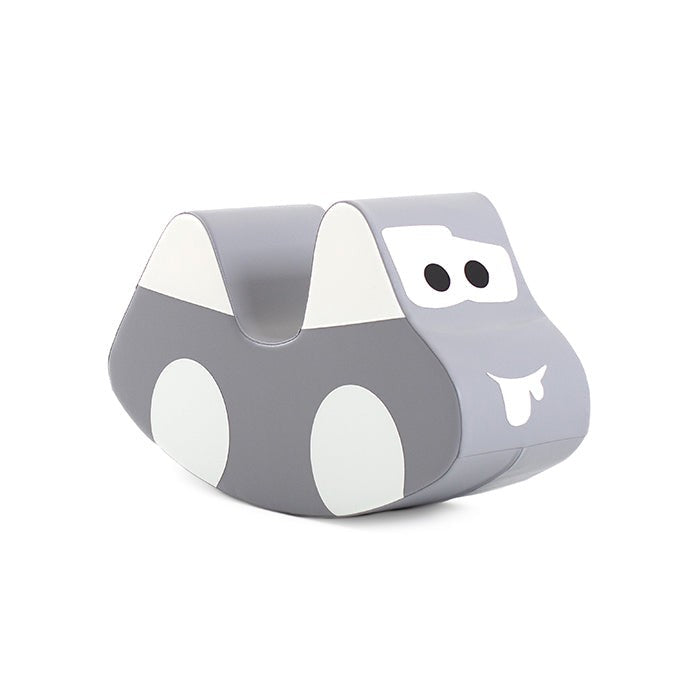 grey soft play ride-on car for toddlers, promoting balance and motor skills in a cozy home setting