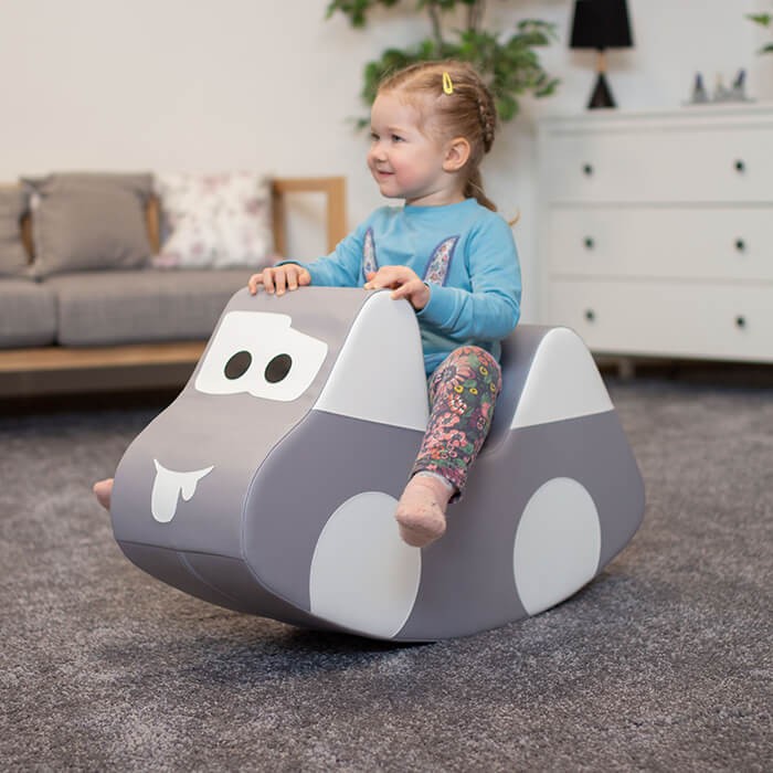 soft grey ride-on car toy for toddlers, cozy and safe for indoor play, encouraging balance and imagination