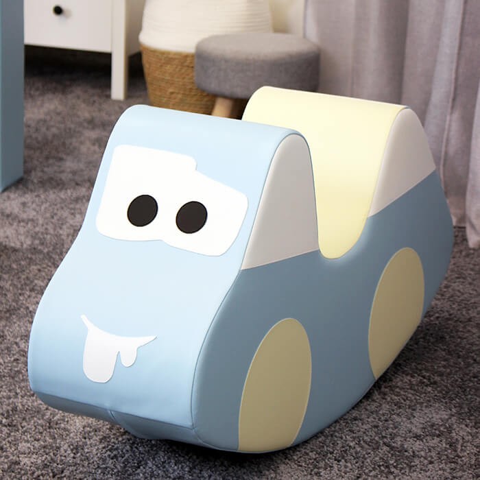 playful light blue soft ride-on car toy for toddlers, boosting balance and giggles on a sunny floor