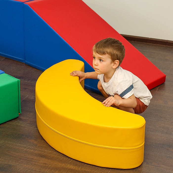 sunlit yellow banana rocking toy with soft curves, inviting toddlers to giggle and sway safely