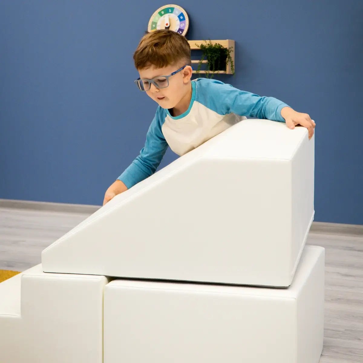 white soft play tunnel set with kids crawling through, fostering creativity and social skills