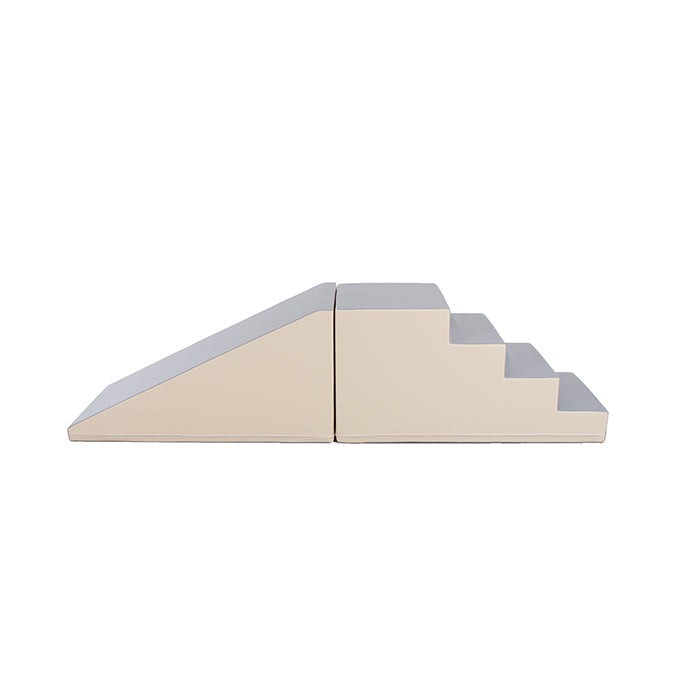 beige and grey soft play step and slide set with kids climbing and giggling in a sunlit playroom