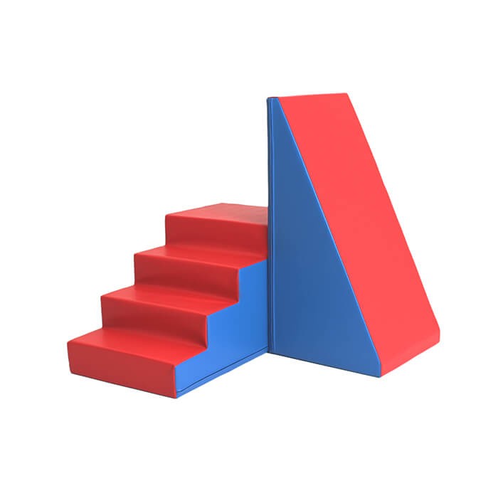 kids giggling on a blue and red soft play slide set, climbing and sliding with joyful energy