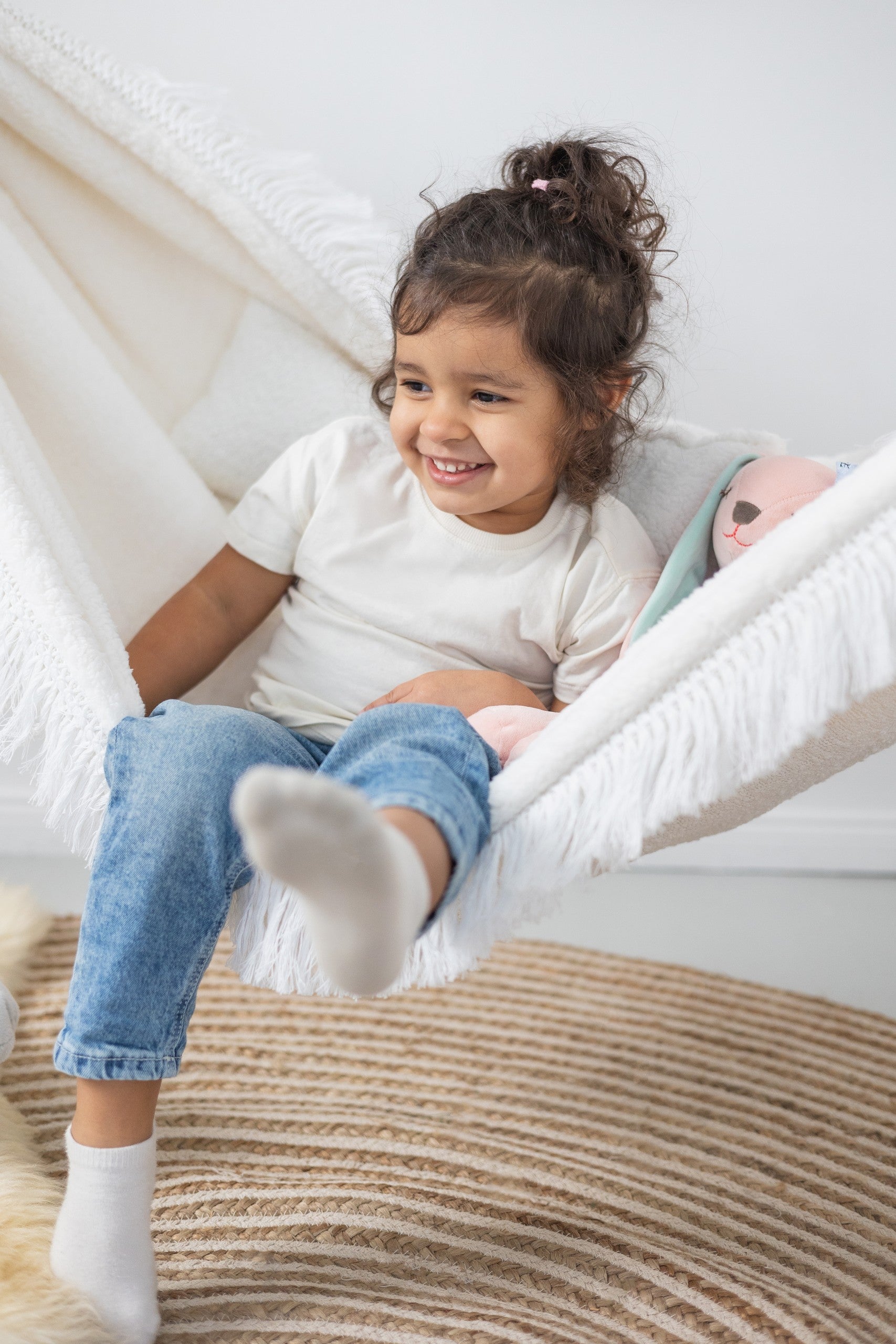 Polar Hug Hammock: Dreamy and Cozy Kids' Boucle Swing - Safe, Handmade, and Fits Any Decor by Sówka at www.brixbailey.com