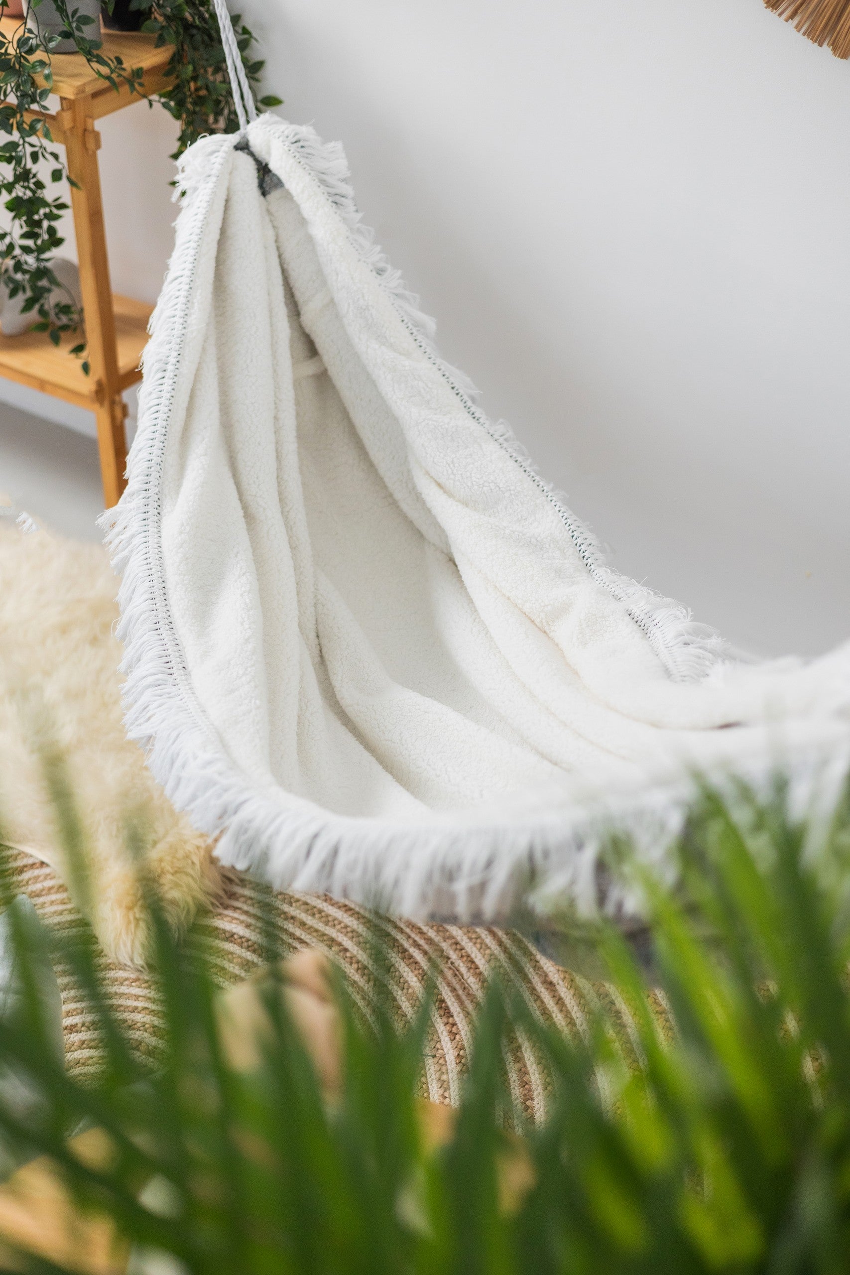 The Polar Hug Hammock - Cozy, Fluffy & Kid-Safe Swing Chair for Dreamy Interiors by Sówka at www.brixbailey.com