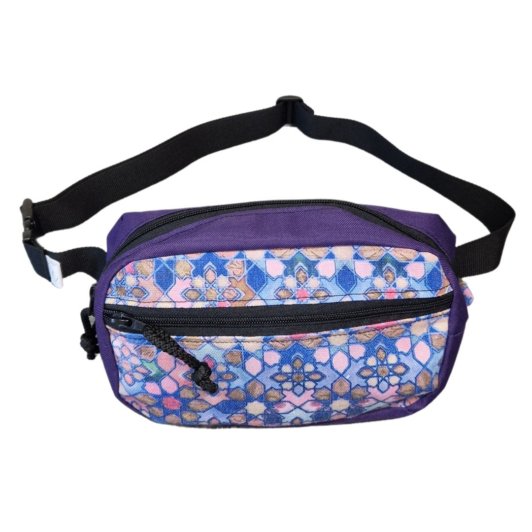 elegant handmade waist bag in soft lighting, showcasing its refined modern style and artisan craftsmanship